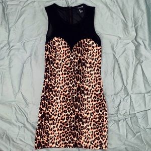 Cheetah Dress that has a black mesh top/back.